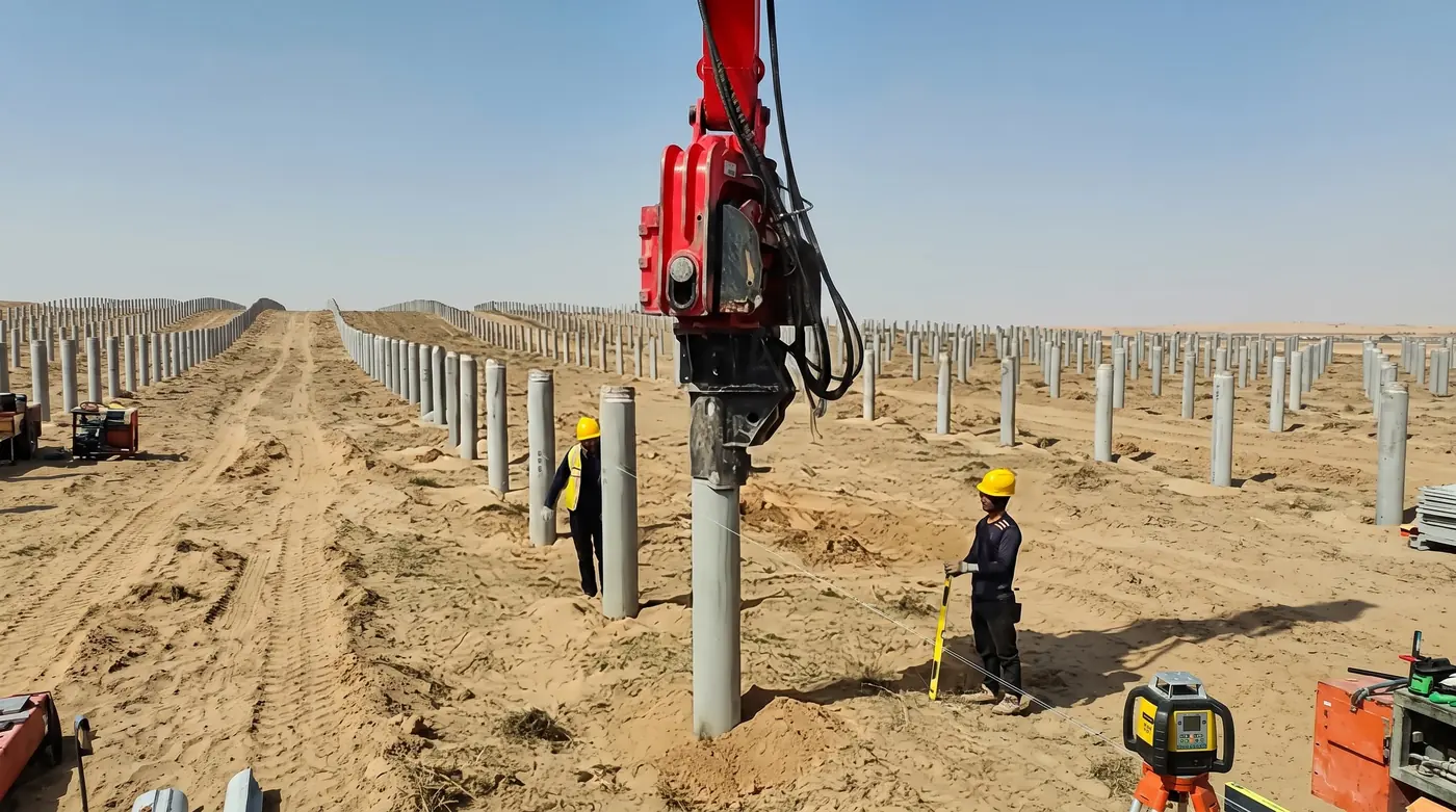 FEROX excavator pile driver installing concrete piles